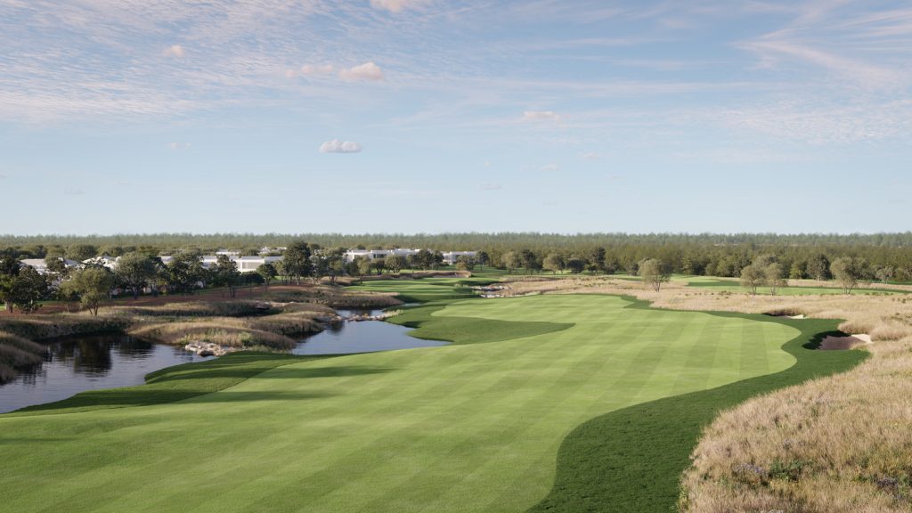 Scenic view of the Els Club Vilamoura golf course, showcasing perfectly manicured fairways, serene water features, and natural surroundings under a clear blue sky. A luxurious golfing experience in the Algarve, designed for excellence and tranquility.